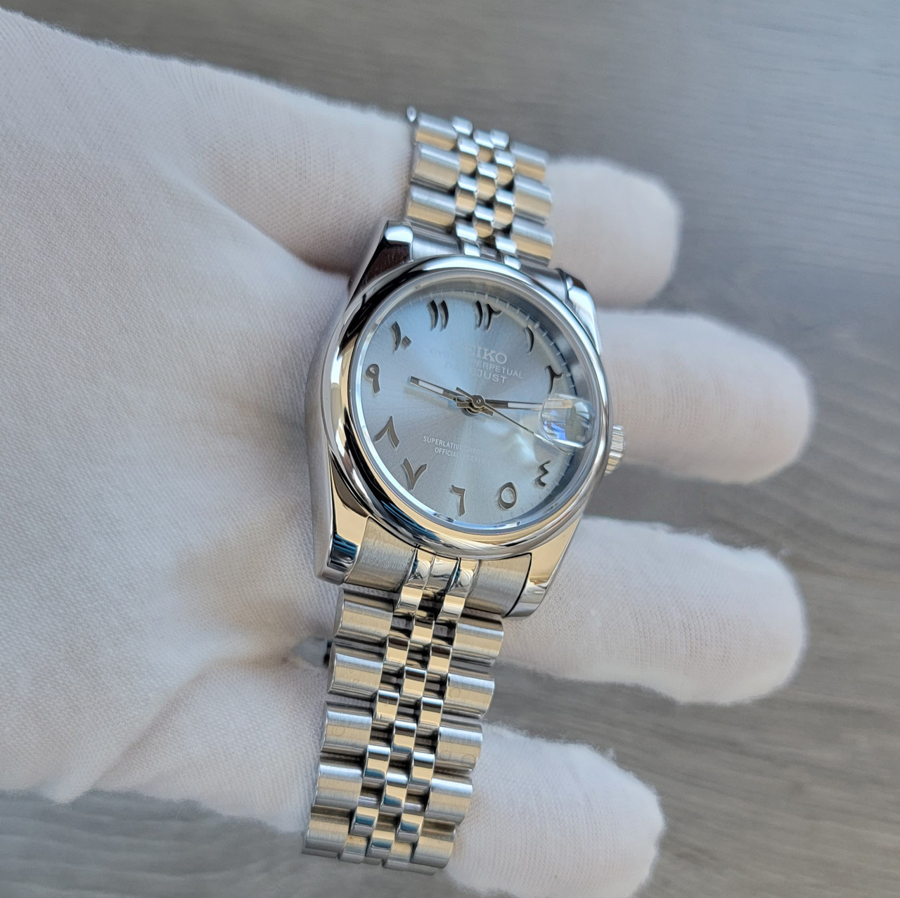 Sunburst Ice Blue Arabic Ghost Dial