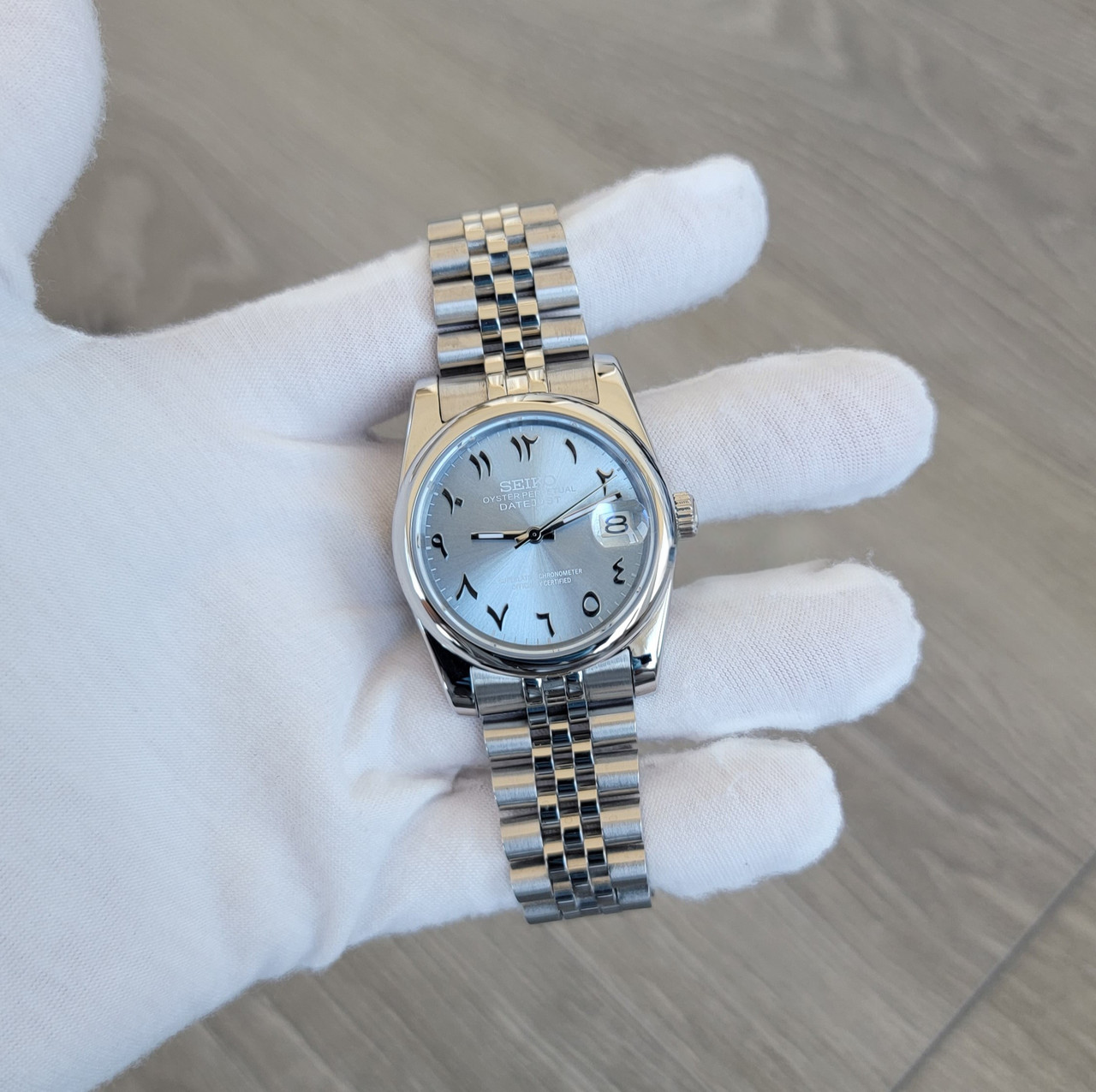 Sunburst Ice Blue Arabic Ghost Dial