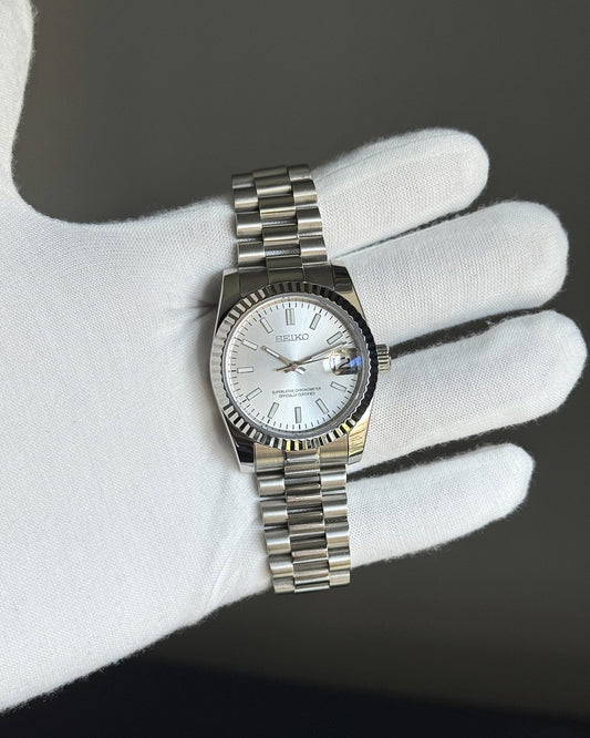 Sunburst White Dial