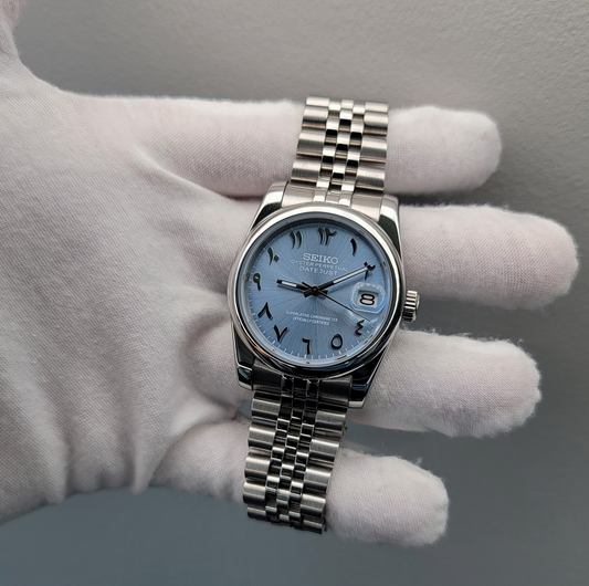 Sunburst Ice Blue Arabic Ghost Dial