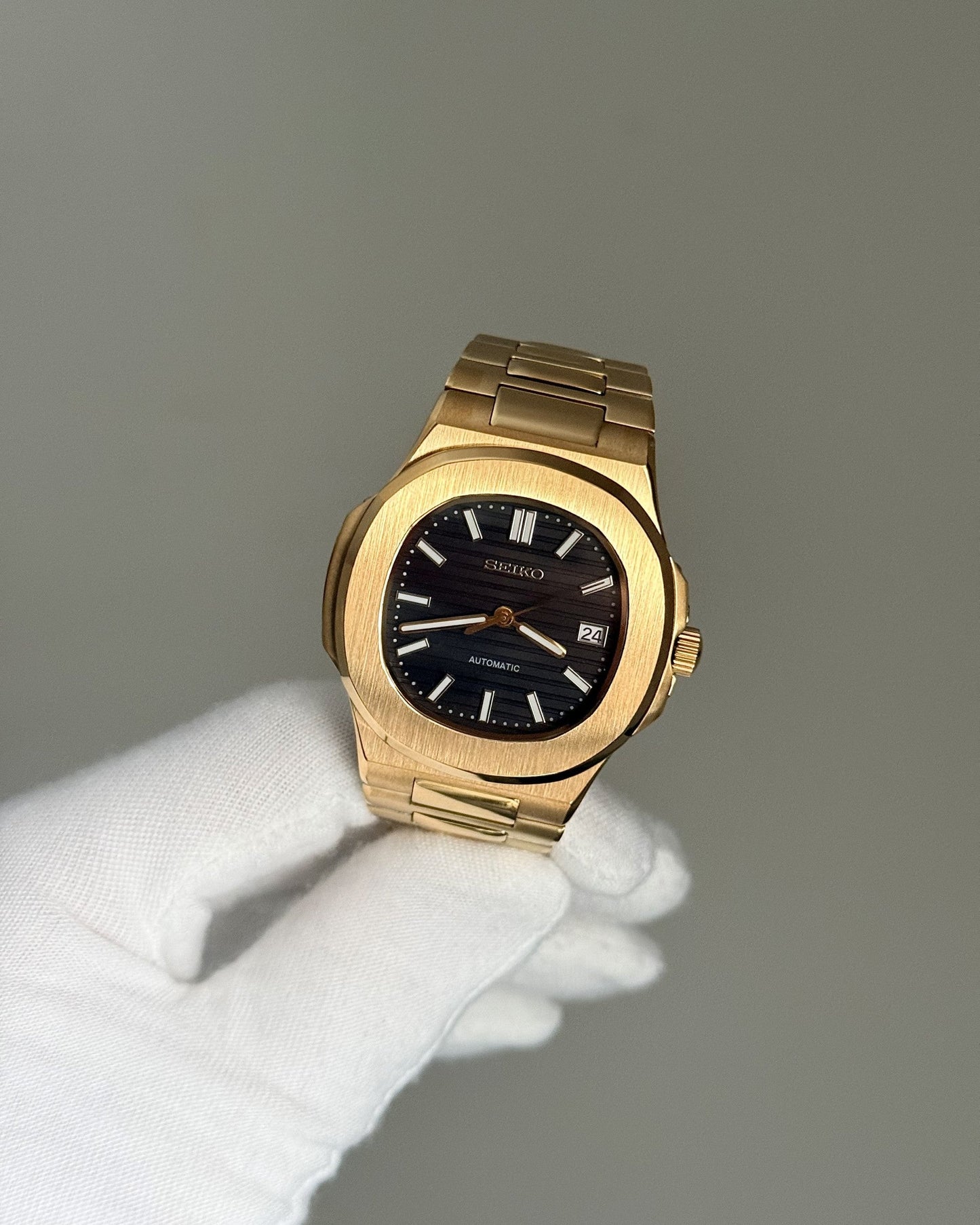 Nautilus YG Black Embossed Dial